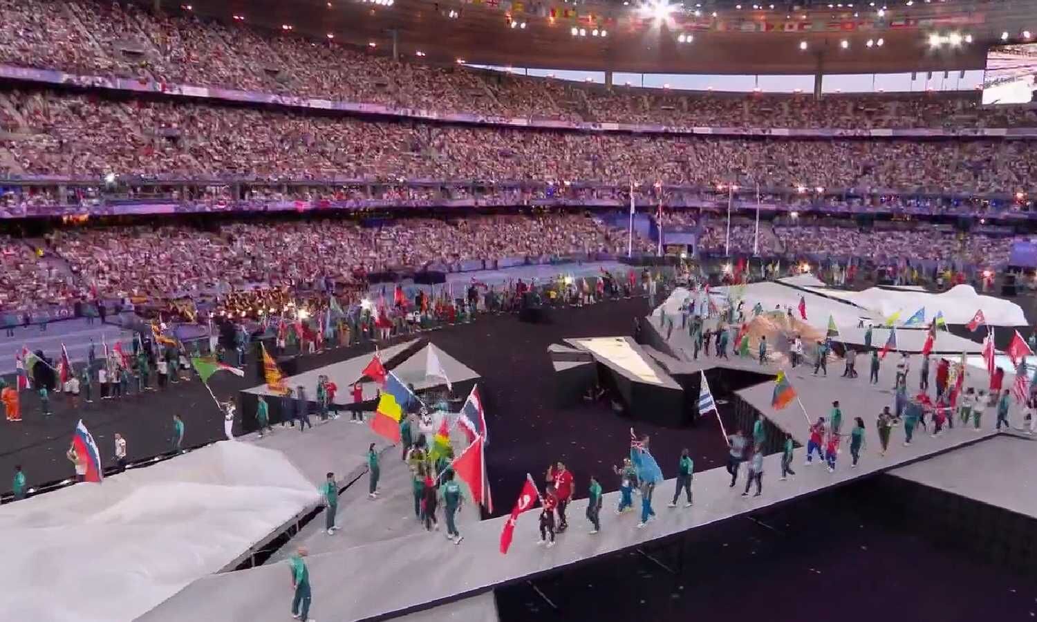 The flag-bearers and athletes at the parade