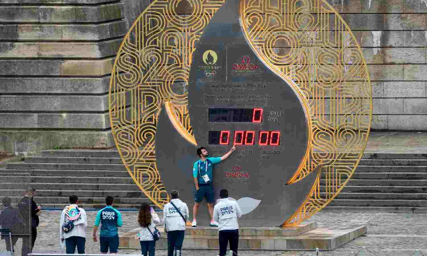 A volunteer points to a counter in Paris, France,... ... Olympics 2024 Opening ceremony Live: PV Sindhu, Sharath Kamal lead team India in the opening ceremony